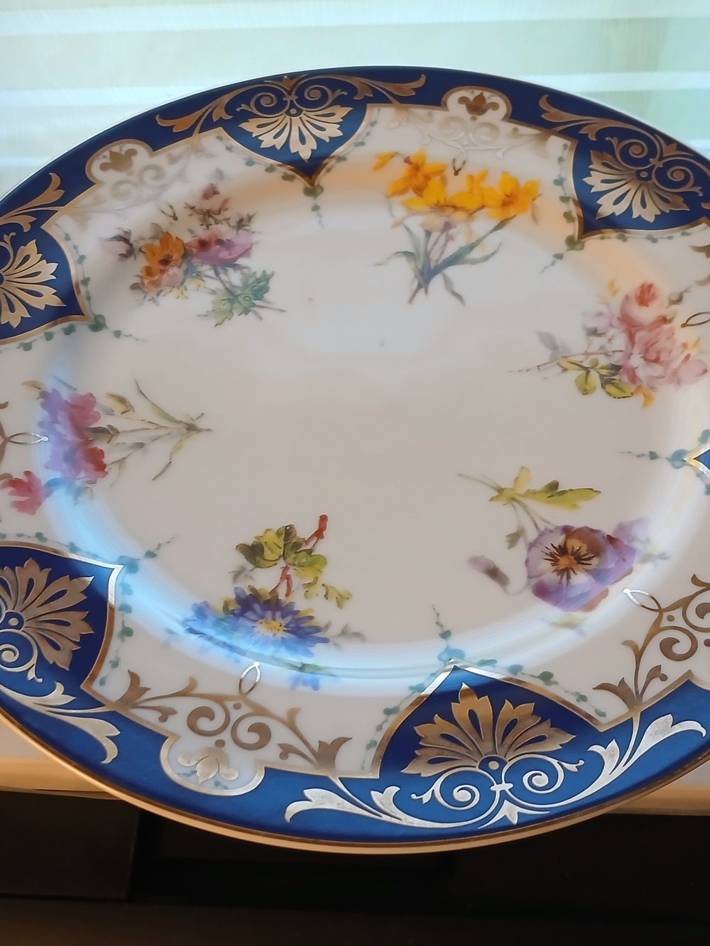 Porcelain Dinner Plate in Blue, Gold and Floral Accents